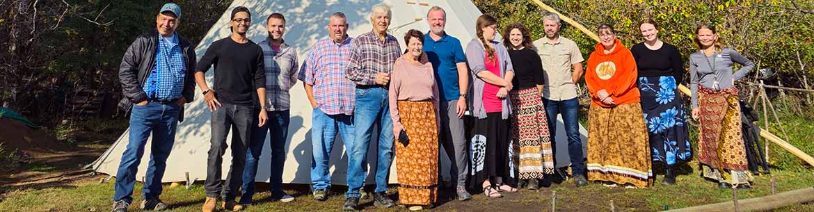 The Stewards of Wabano Aki and community members at the Wabano Aki sign unveiling in MB (Photo by Fayaz Hasan)