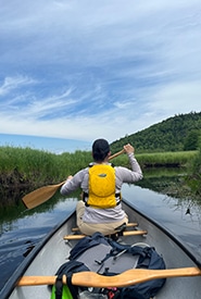Marie-Ève Côté on canoe at Musquodoboit River Valley Nature Reserve, NS (Photo NCC)